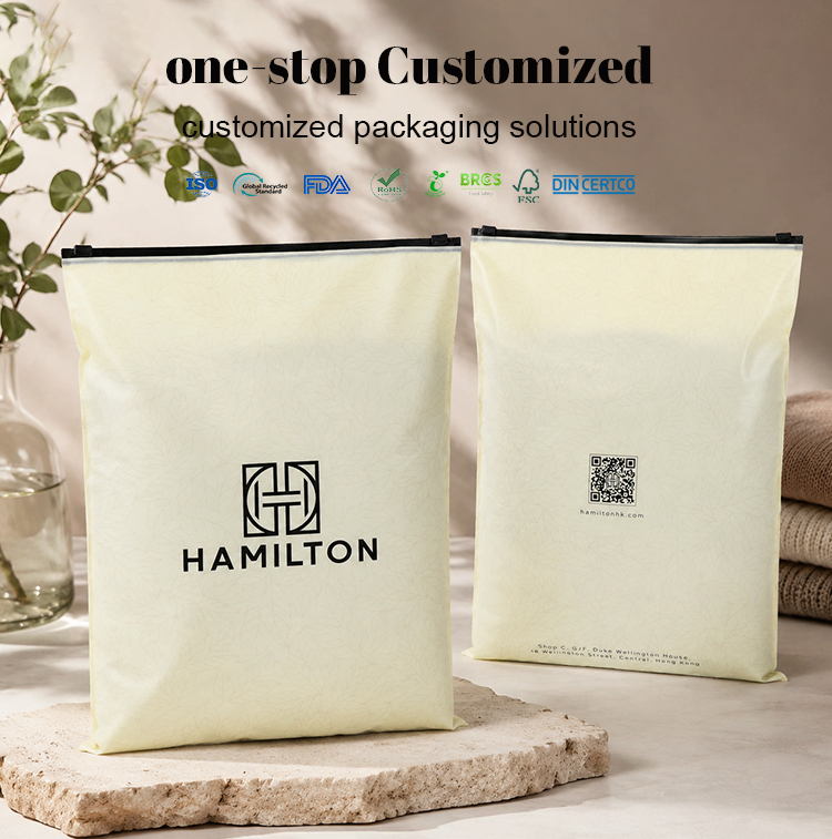 Custom logo slider zipper pouches with multiple certification marks, apparel packaging.
